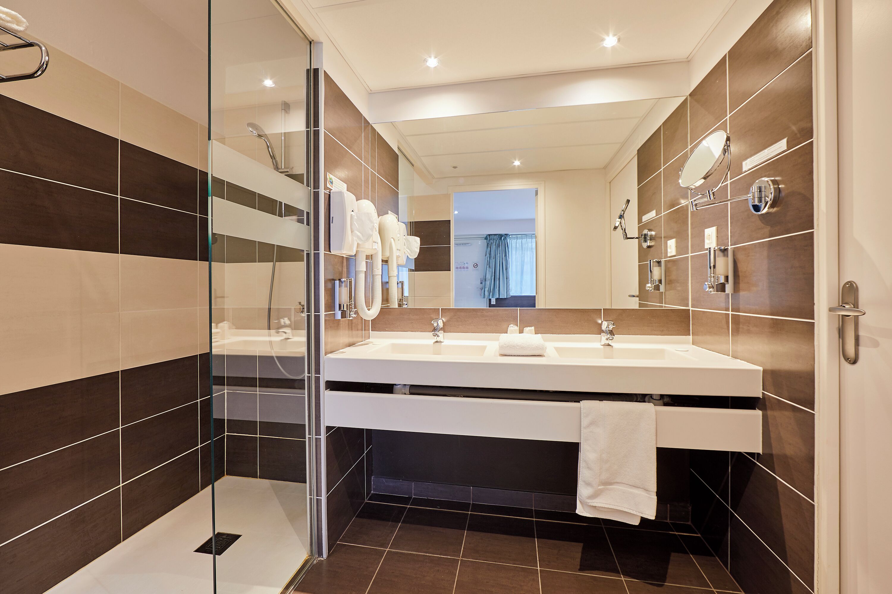 superior double room | bathroom | hair dryer, heated floors, towels, soap