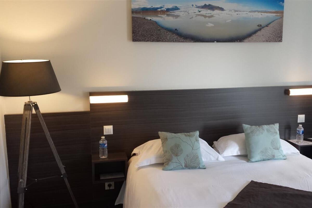 Premium bedding, desk, laptop workspace, blackout curtains