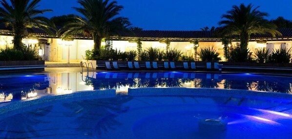 Indoor pool, outdoor pool, pool umbrellas, sun loungers