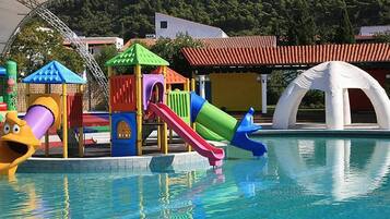 Indoor pool, outdoor pool, pool umbrellas, sun loungers