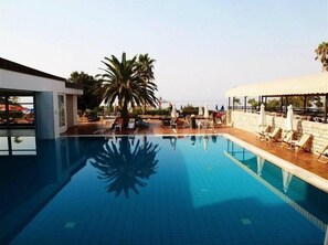 Indoor pool, outdoor pool, pool umbrellas, sun loungers