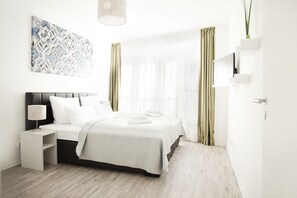 Appartement majestueux, 3 chambres | Literie de qualité, minibar, coffre-fort, décor unique