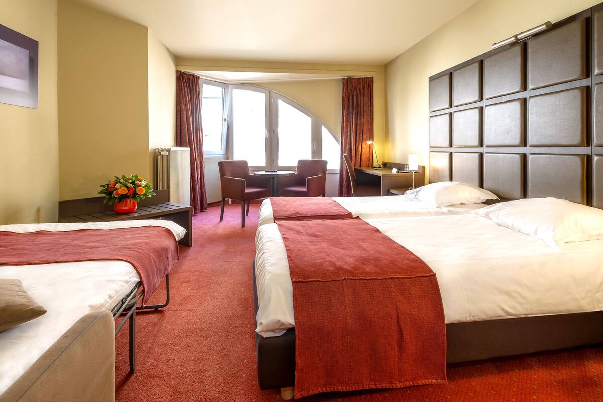 superior twin room | down duvets, in-room safe, desk, cots/infant beds