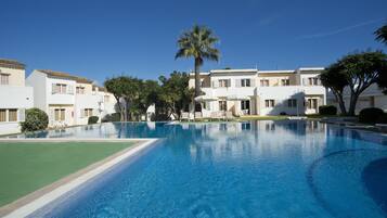 Outdoor pool, pool umbrellas, pool loungers