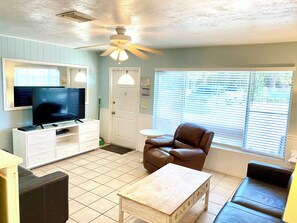 2 Bedroom Beachside View Unit #2 (at White Sands) | Living area | 42-inch LCD TV with cable channels, TV, video game console - Tropical Breeze Beach Club (Holmes Beach)