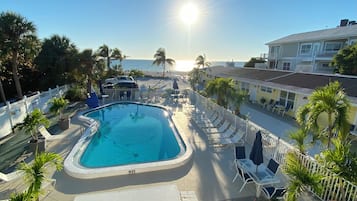 Outdoor pool, pool umbrellas, pool loungers
