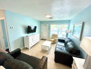 1 Bedroom Pool Front Units #3, #4, & #5, (at White Sands) | Living area | 42-inch LCD TV with cable channels, TV, video-game console