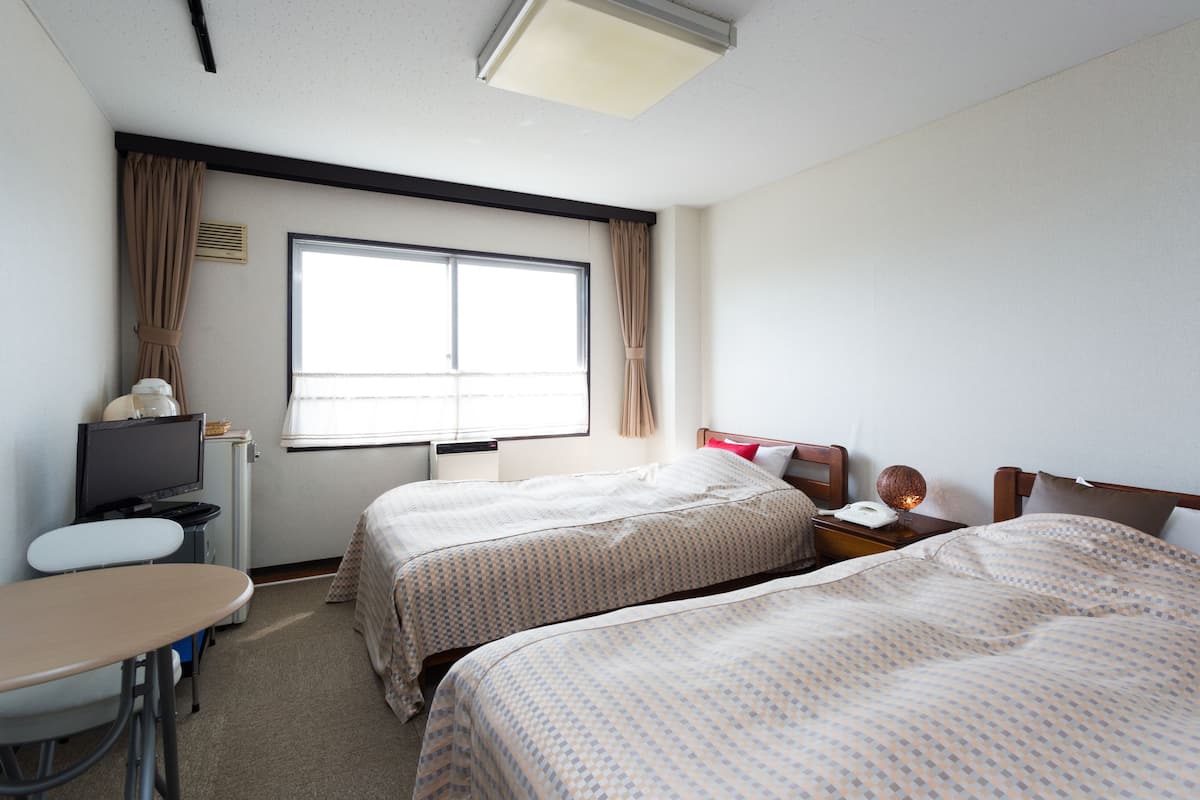 Twin Room, Non Smoking | In-room safe, desk, free WiFi