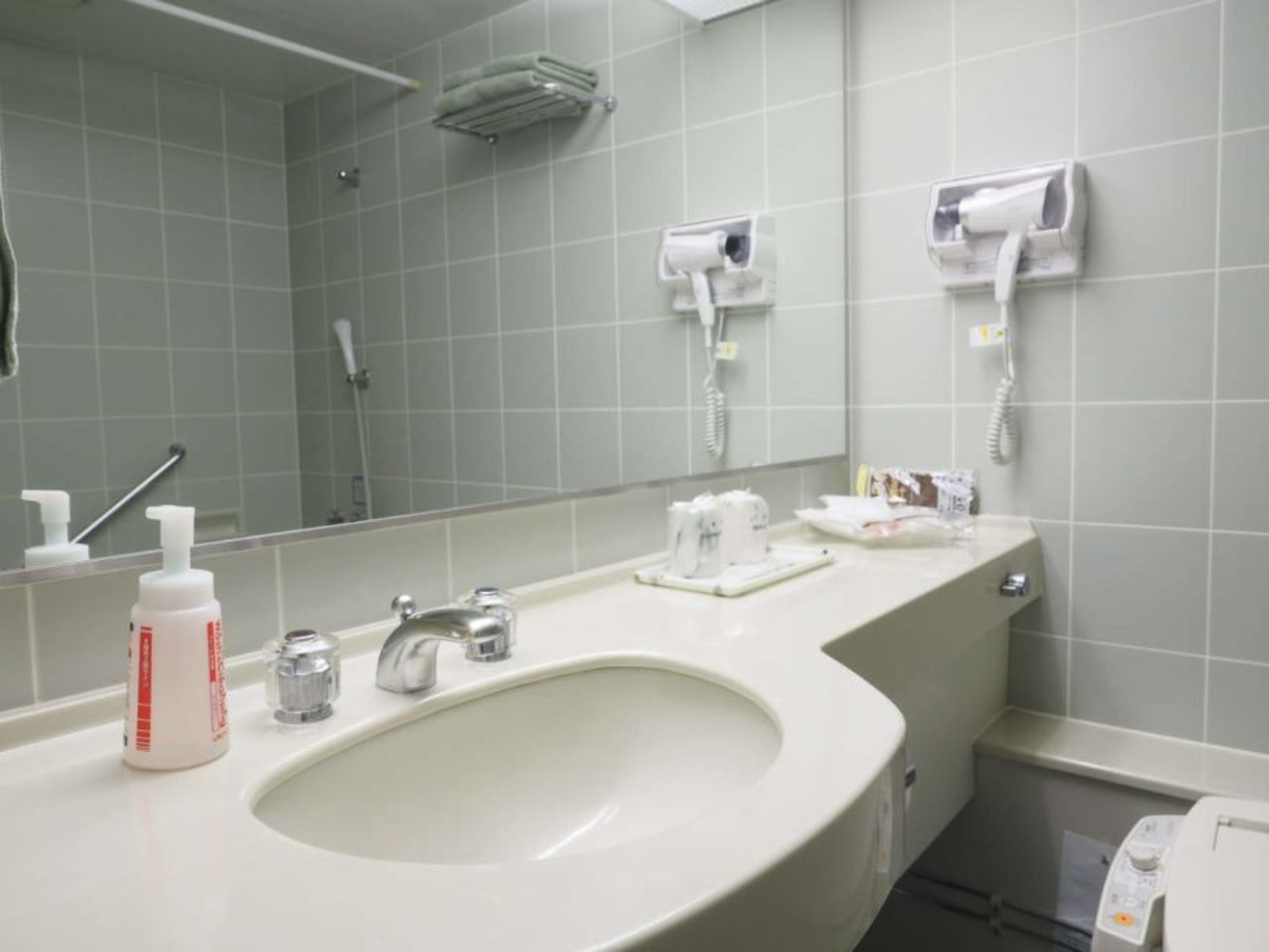 hotel twin room | bathroom | separate bathtub and shower, deep-soaking bathtub, free toiletries