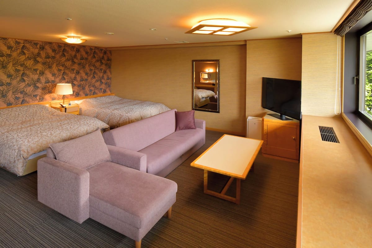 deluxe western twin rooms, non smoking	 (extra bed for 3rd person)  | 1 bedroom, down duvets, in-room safe, iron/ironing board