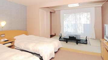 خزنة داخل الغرفة ومكواة/لوح كي وواي فاي مجانًا وملاءات أسرّة