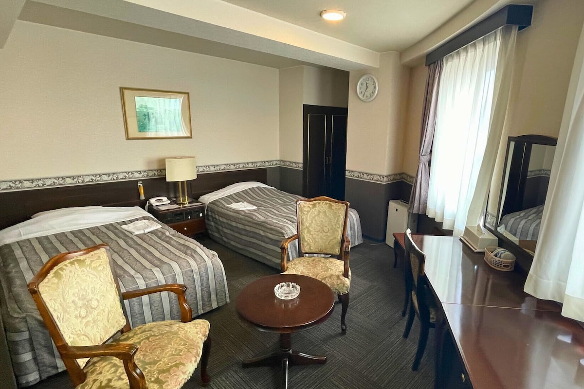 Deluxe Twin kamer, uitzicht op de stad | 1 slaapkamer, een bureau, gratis wifi