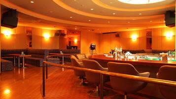 A bar area with seating and a counter.
