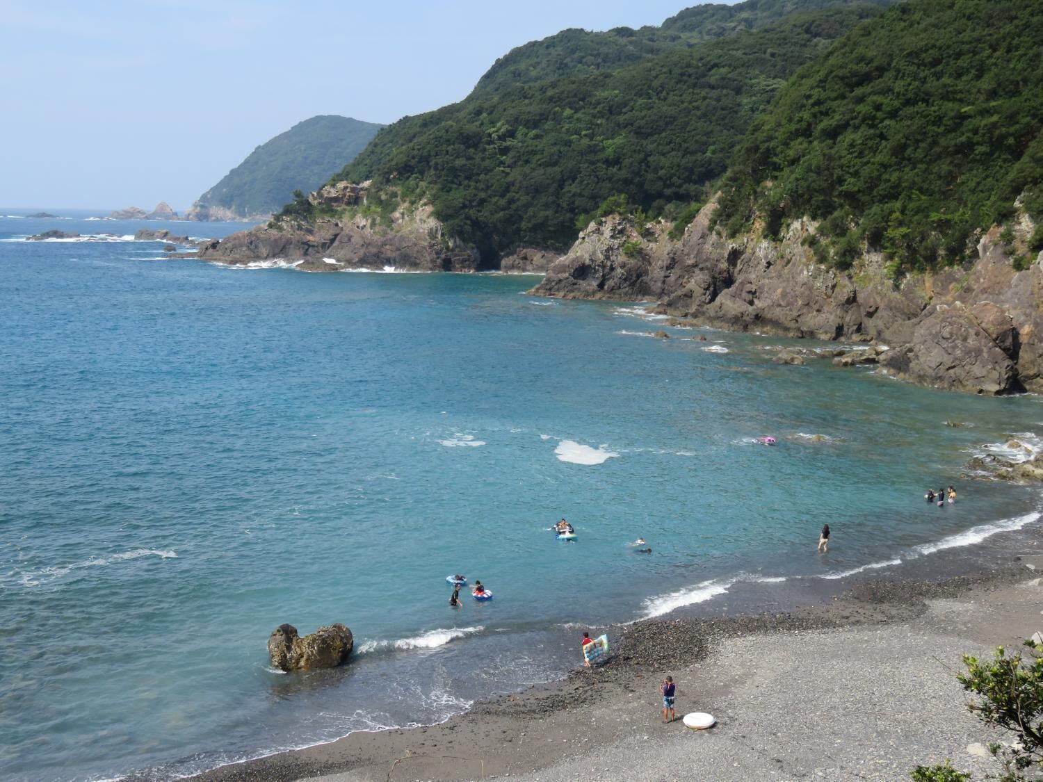 on the beach, black sand