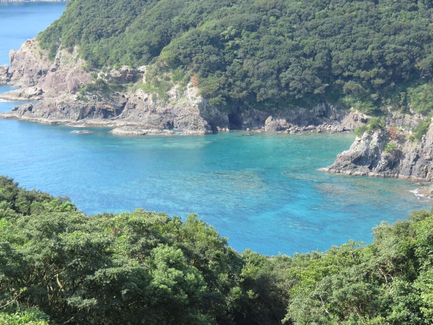 on the beach, black sand
