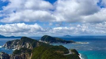 On the beach, black sand