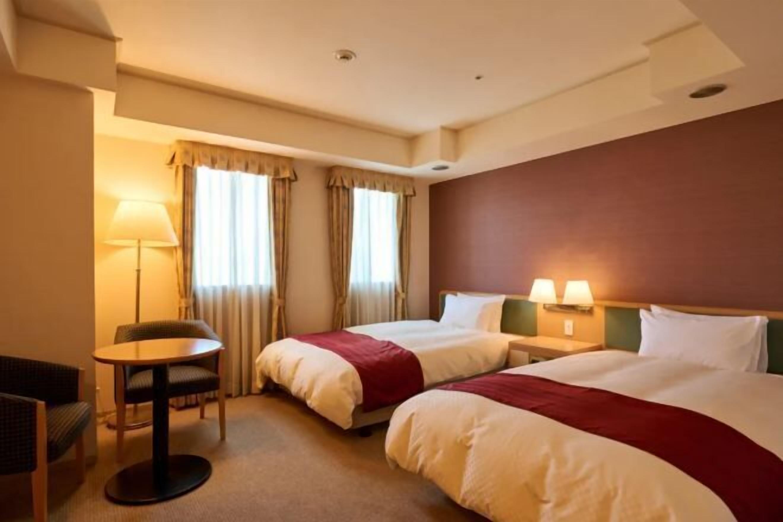 Desk, blackout curtains, free WiFi, bed sheets