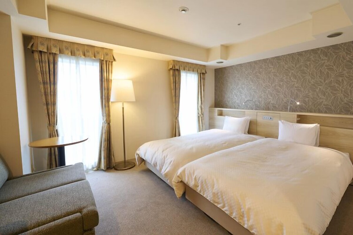 Desk, blackout curtains, free WiFi, bed sheets