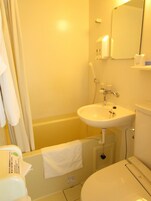 Combined shower/tub, deep soaking tub, free toiletries, hair dryer