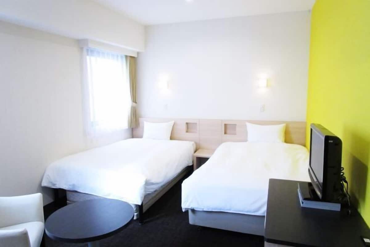 Desk, blackout curtains, free WiFi, bed sheets