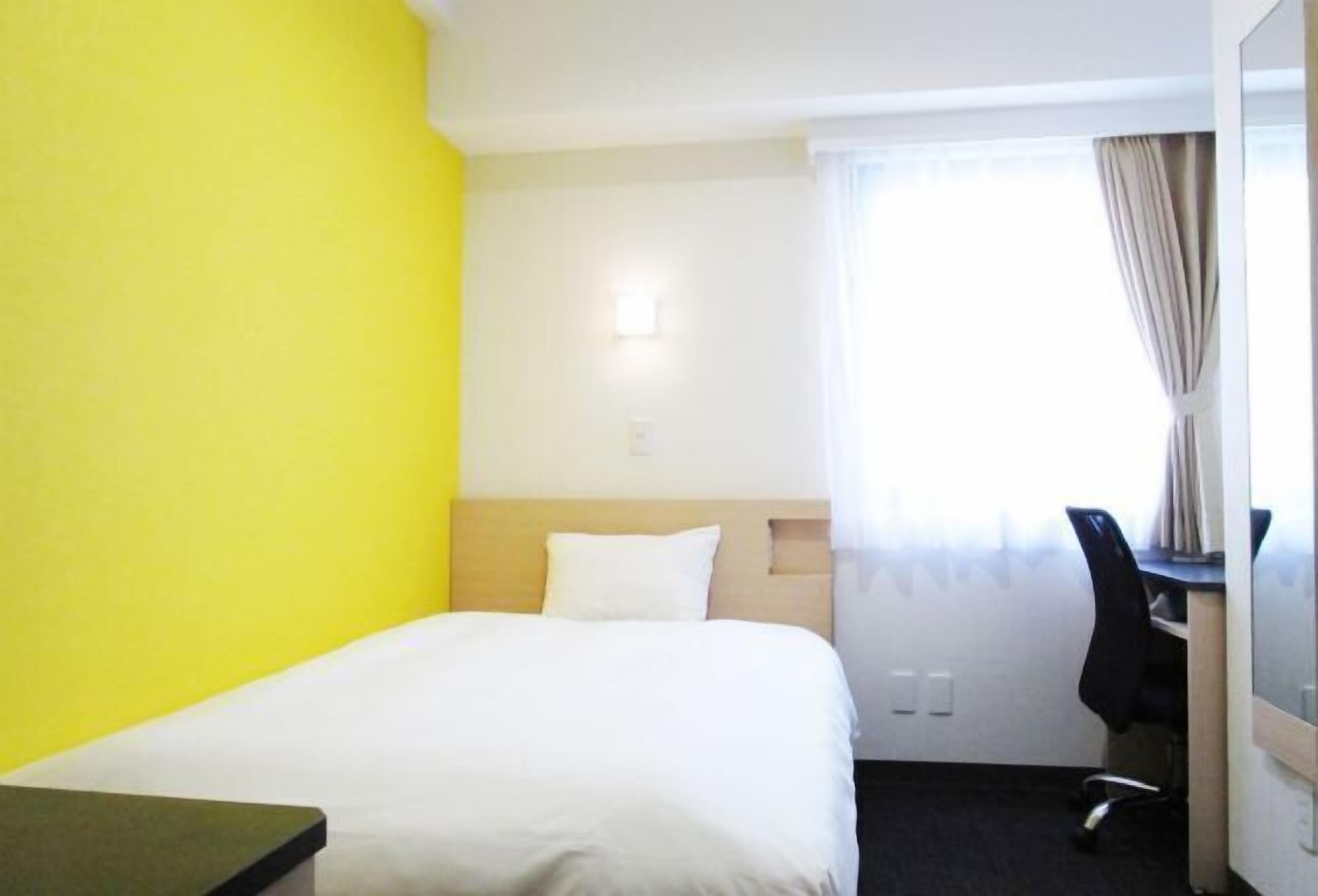 Desk, blackout curtains, free WiFi, bed sheets