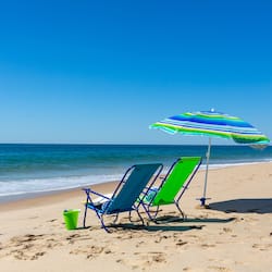 On the beach, sun loungers, beach umbrellas, beach towels