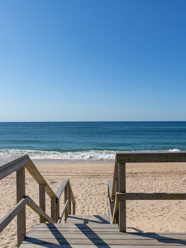 On the beach, sun loungers, beach umbrellas, beach towels