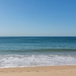 On the beach, sun loungers, beach umbrellas, beach towels