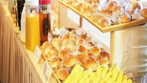 A breakfast buffet with various food items and beverages. - Nagano Plaza Hotel (Nagano)