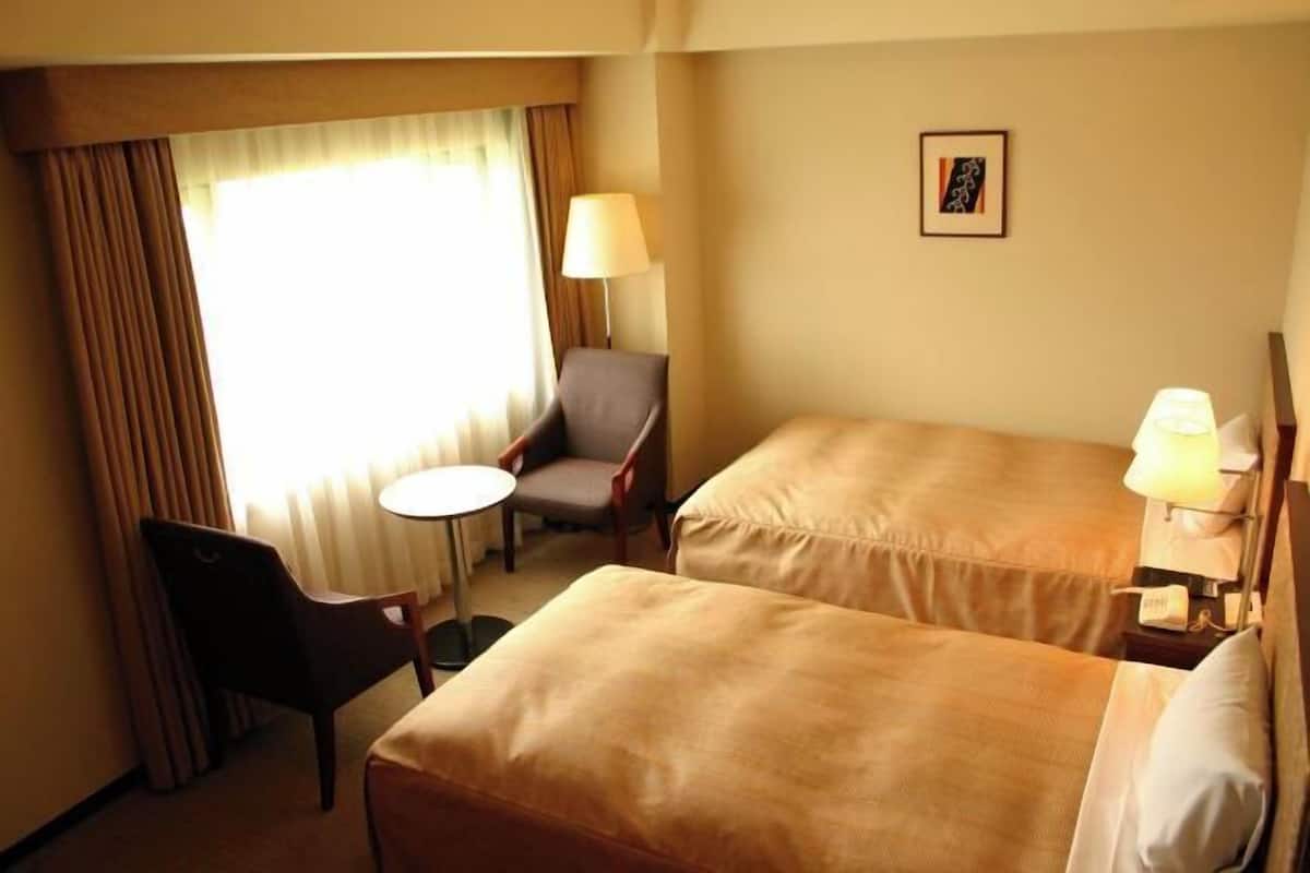 Blackout drapes, iron/ironing board, free WiFi