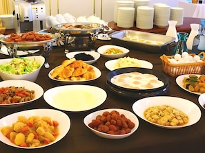 A buffet table with various dishes, including salads, meats, and desserts. - Sakaide Plaza Hotel (Sakaide)