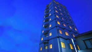 A tall, modern building with multiple balconies and windows, likely a hotel or apartment complex. - Hotel Meijiya (Hamamatsu)