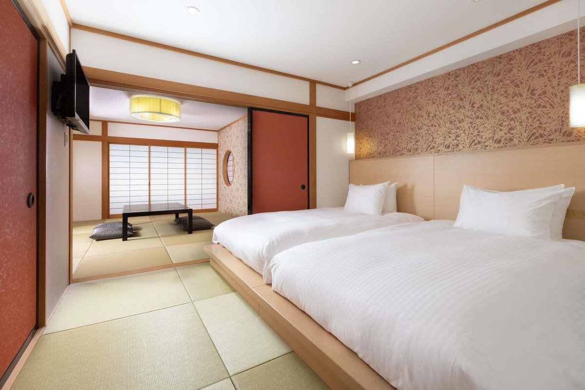 Privilege, Deluxe Suite, 2 Twin Beds, Mountain View | In-room safe, iron/ironing board (on request), WiFi (free), bed sheets