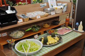 A buffet with various food items and condiments. - Hotel Crown Hills Katsuta (Hitachinaka)