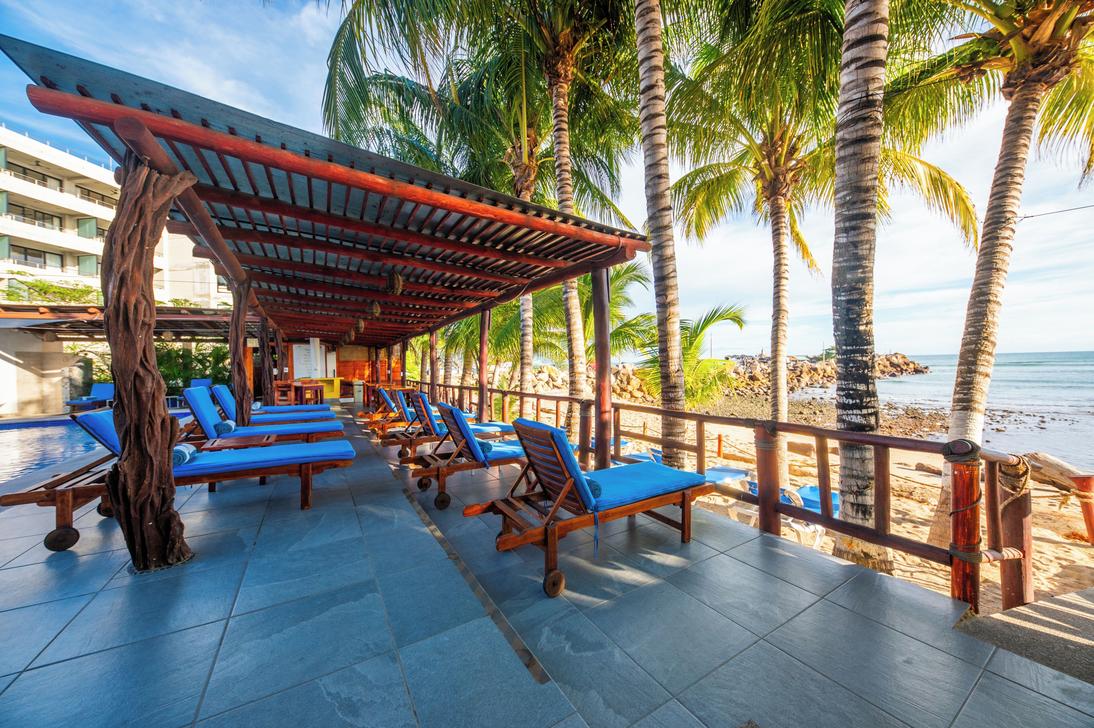 On the beach, sun loungers, beach towels