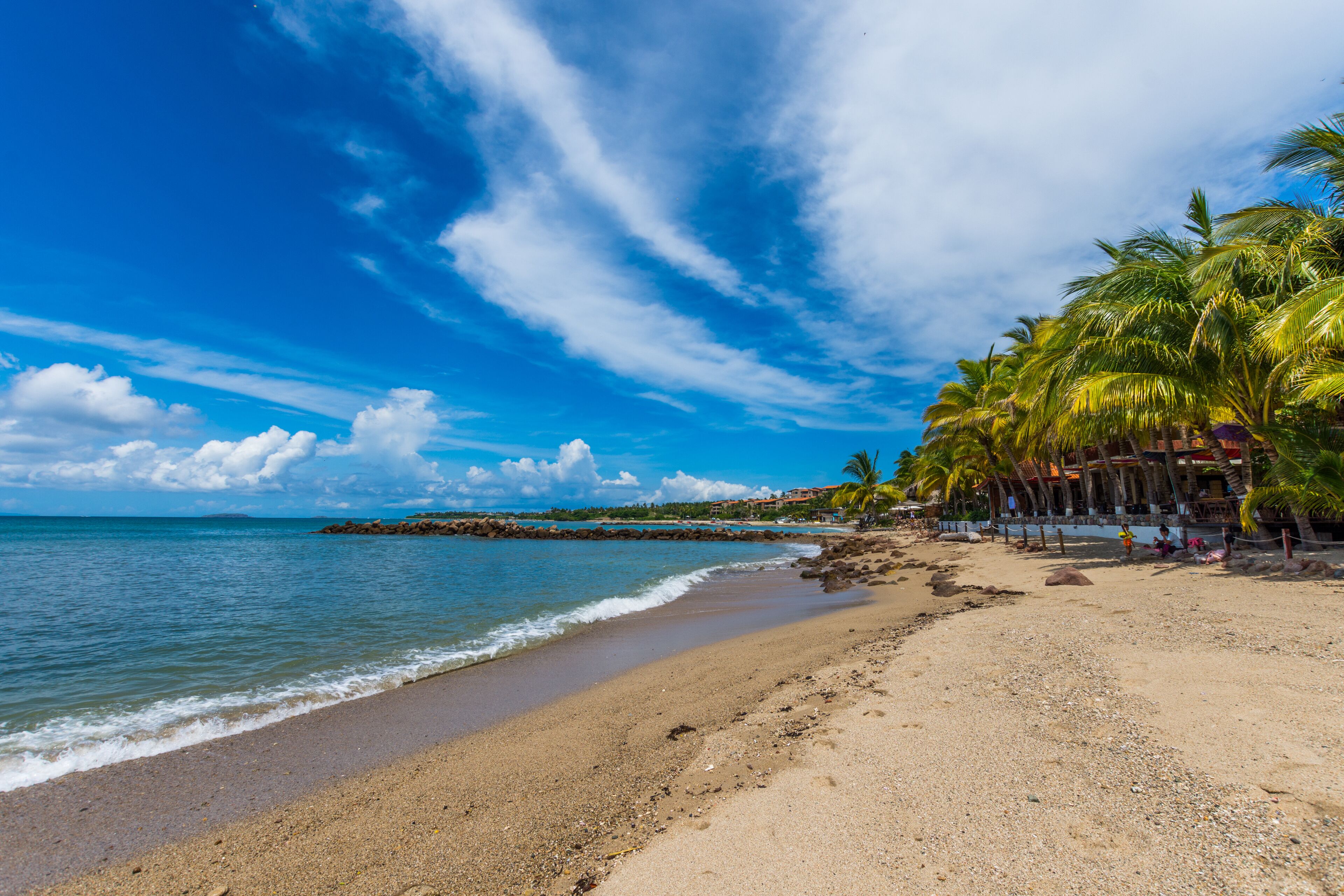 on the beach, sun-loungers, beach towels