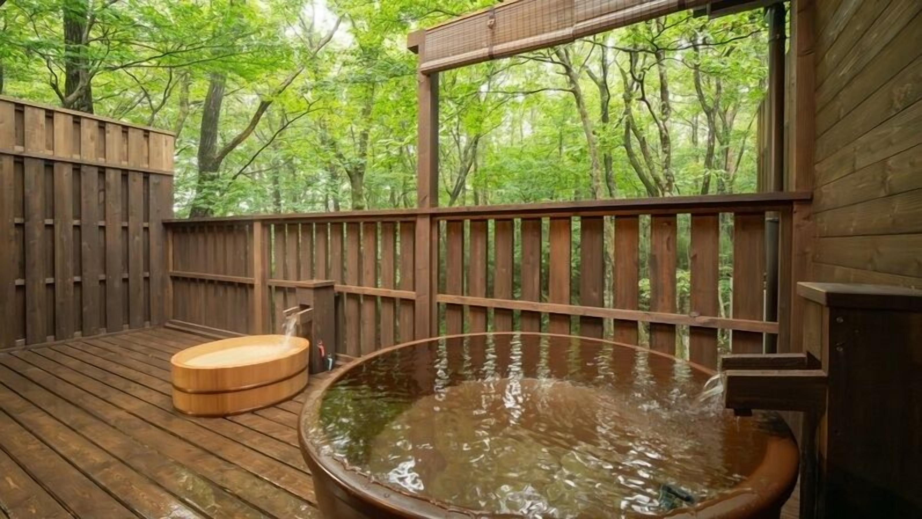 A wooden deck with a hot tub and a wooden bench.