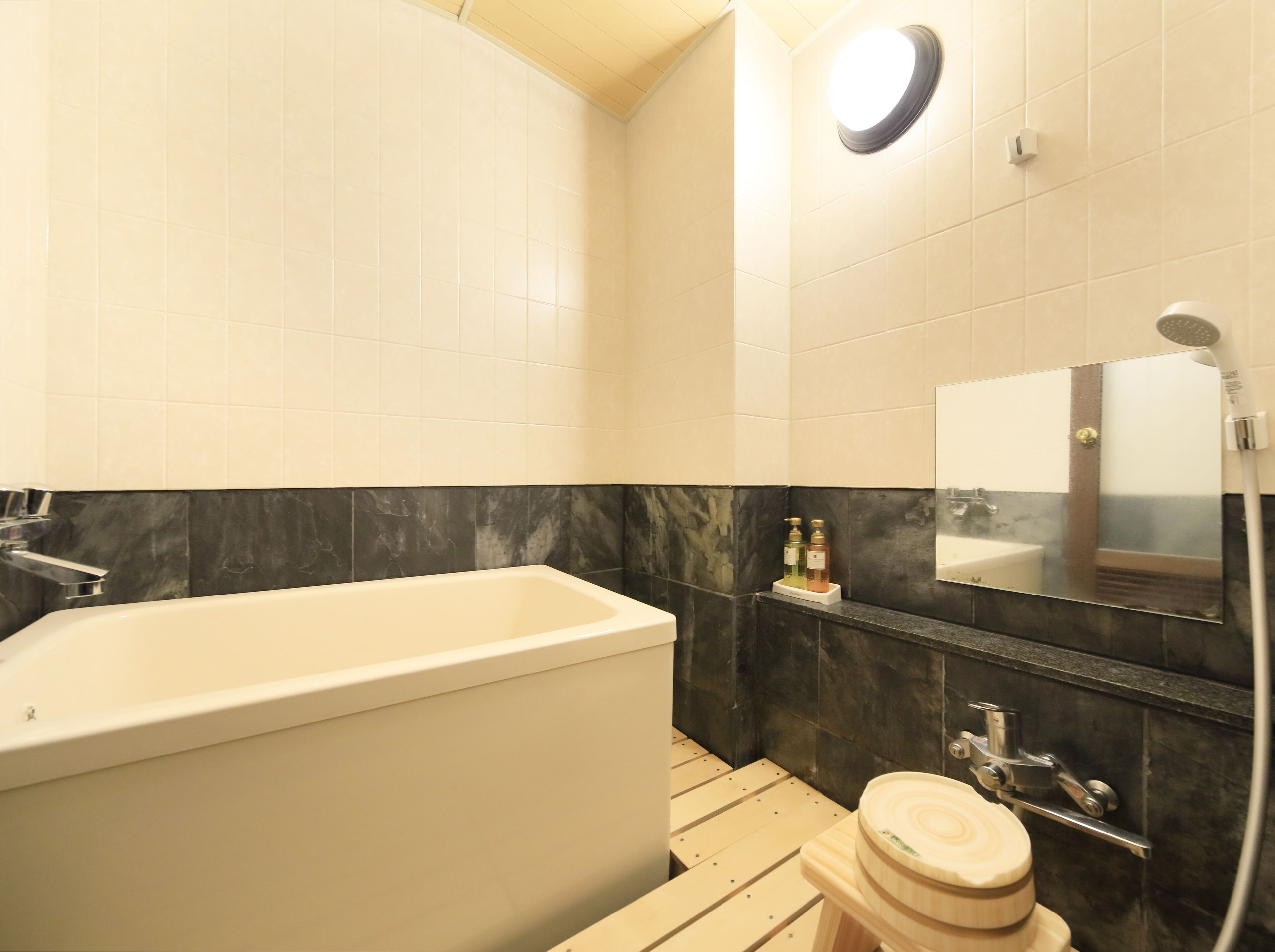 japanese-style superior room (12 tatami) with mountain view, non-smoking | bathroom | combined shower/bathtub, free toiletries, hair dryer, slippers