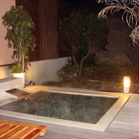 Outdoor spa tub. Time Resort Kakureya