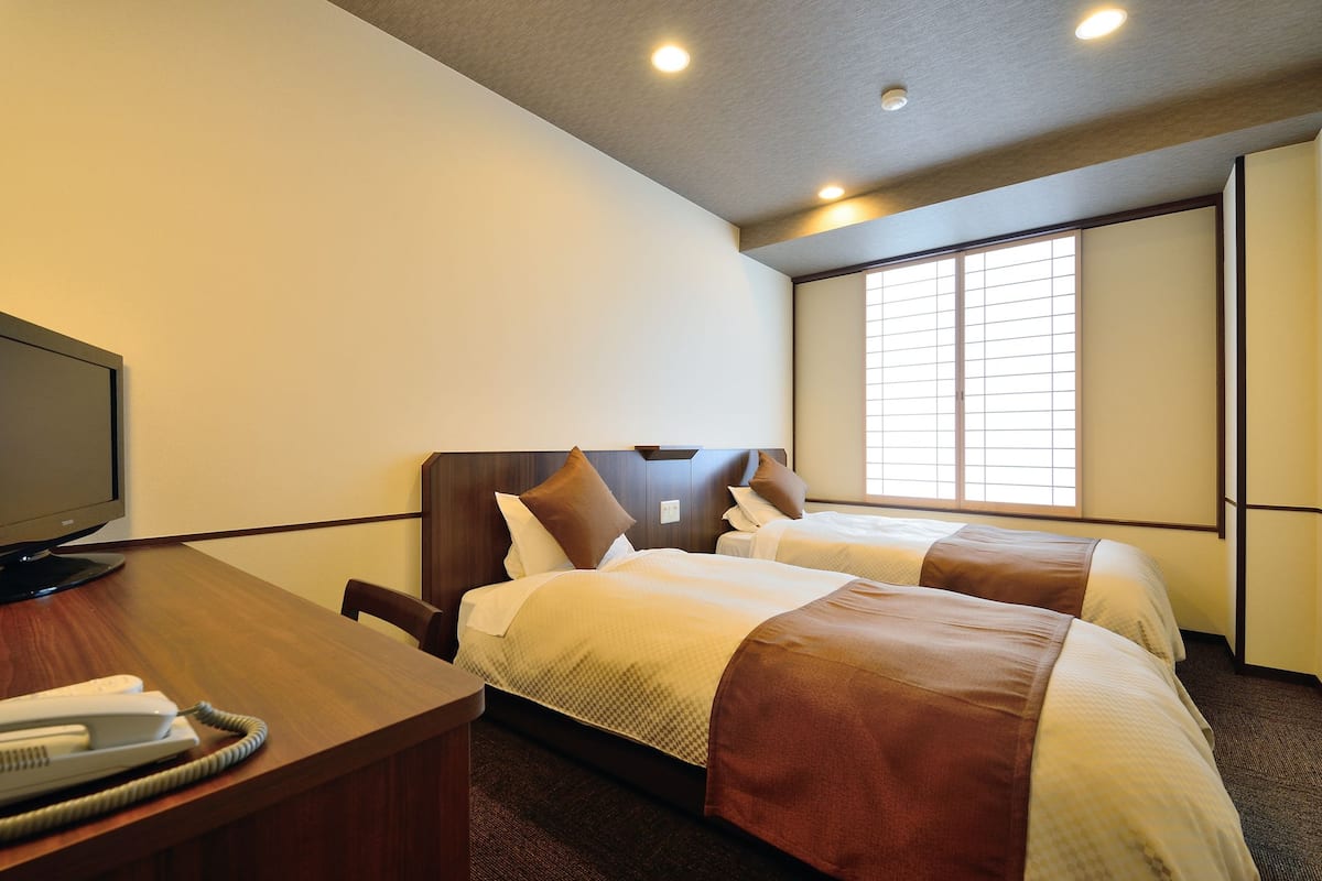 Chambre avec lits jumeaux, non-fumeurs | Wi-Fi gratuit