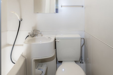 Single Room, Smoking | Bathroom | Combined shower/tub, hair dryer, slippers, towels. Tabist Business Hotel Suehiro Matsuyama