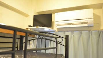 Basic Single Room, 1 Twin Bed | Bathroom | Shower, towels