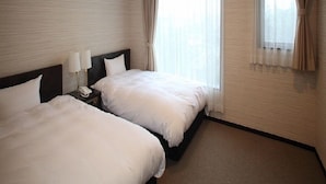 A hotel room with two beds, a nightstand with a lamp, and a window with sheer curtains. - Hotel Rich Garden (Izumo)