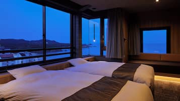 Deluxe Suite, Ocean View | In-room safe, desk, free WiFi, bed sheets