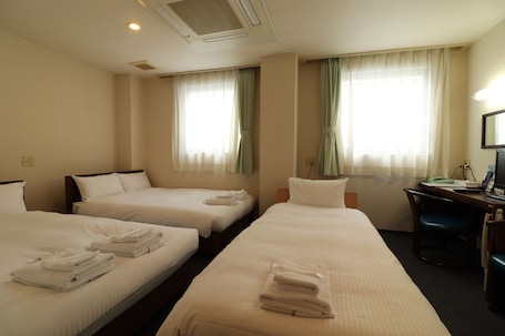 Desk, blackout drapes, free WiFi, bed sheets