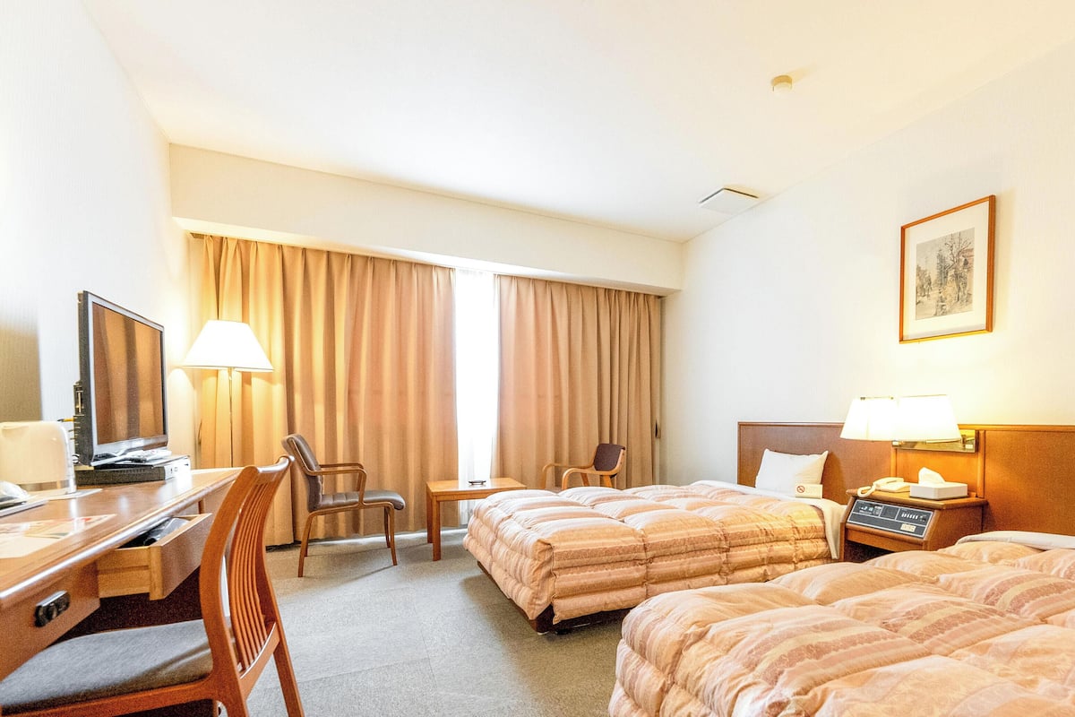 Desk, free WiFi, bed sheets