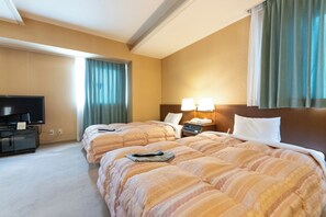 デラックス トリプルルーム 3 ベッドルーム 禁煙 | デスク、WiFi (無料)、ベッドシーツ