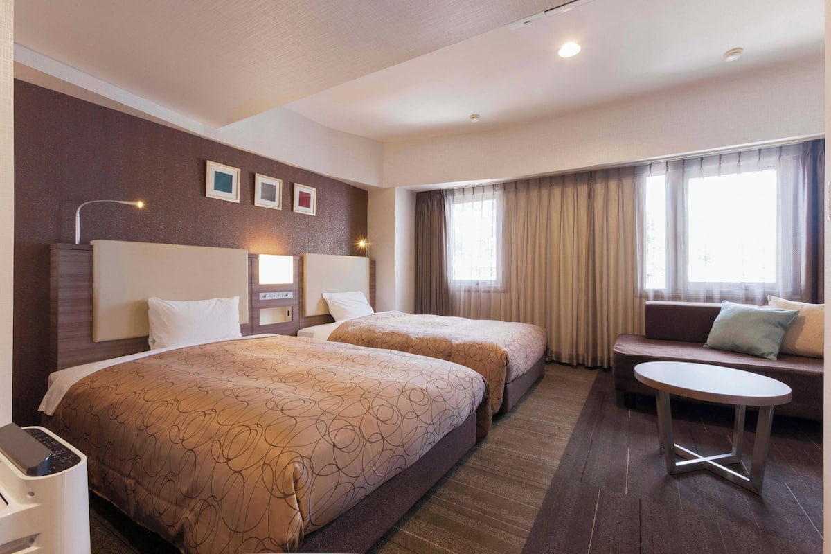 Deluxe Twin kamer, niet-roken, uitzicht op bergen | Een strijkplank/strijkijzer, gratis wifi