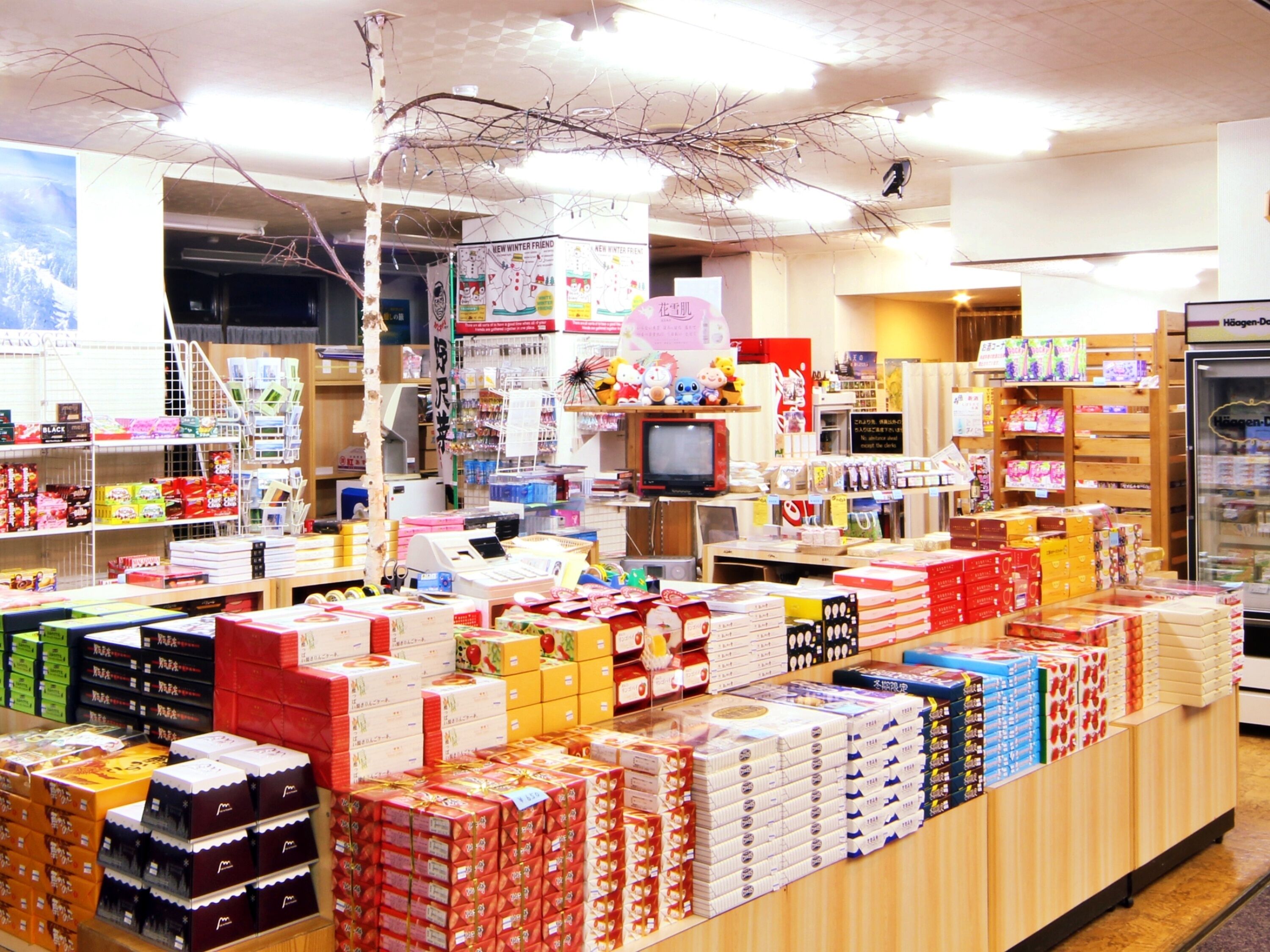 A retail store with various products on shelves and counters.