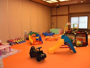 A play area with various toys and play structures. - Onyado Megumi (Yugawara)